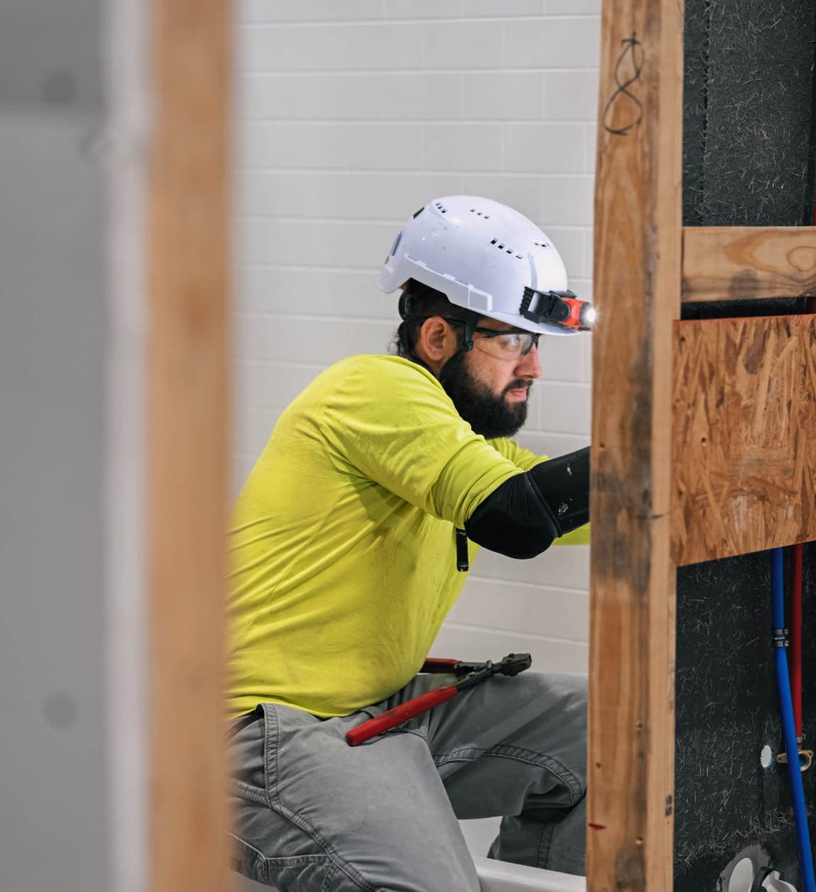 Electrician working on house