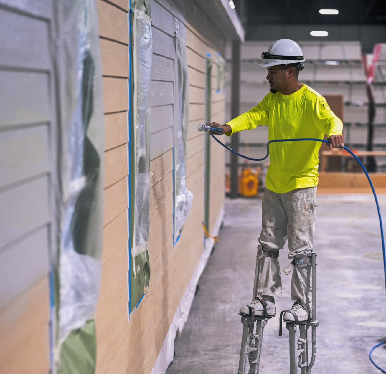 A man painting house