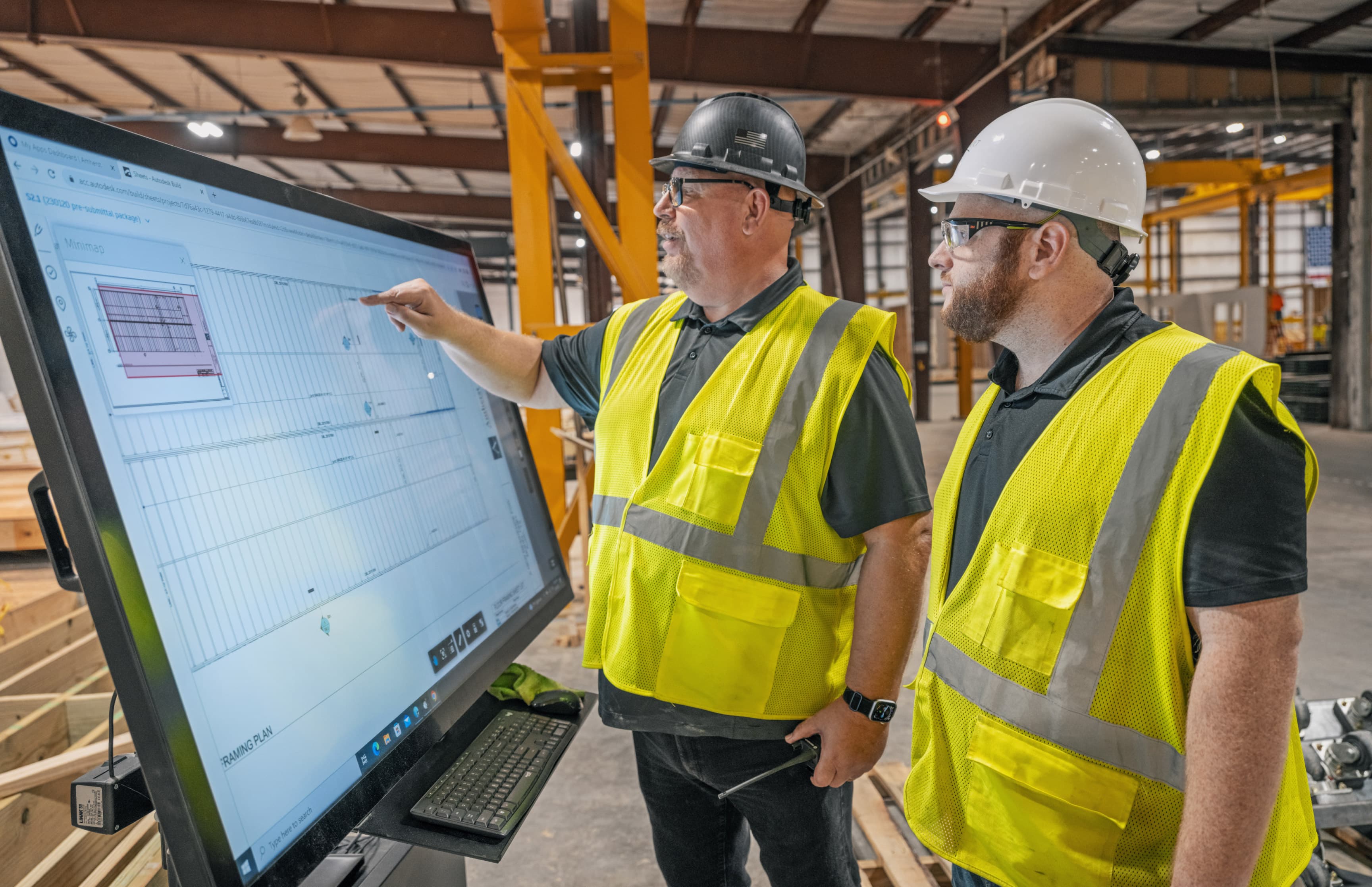 Workers reviewing plans